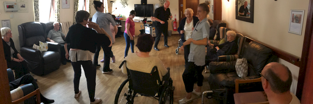 Residents & staff from Coll, Barra & Arran House enjoying an afternoon of singing.